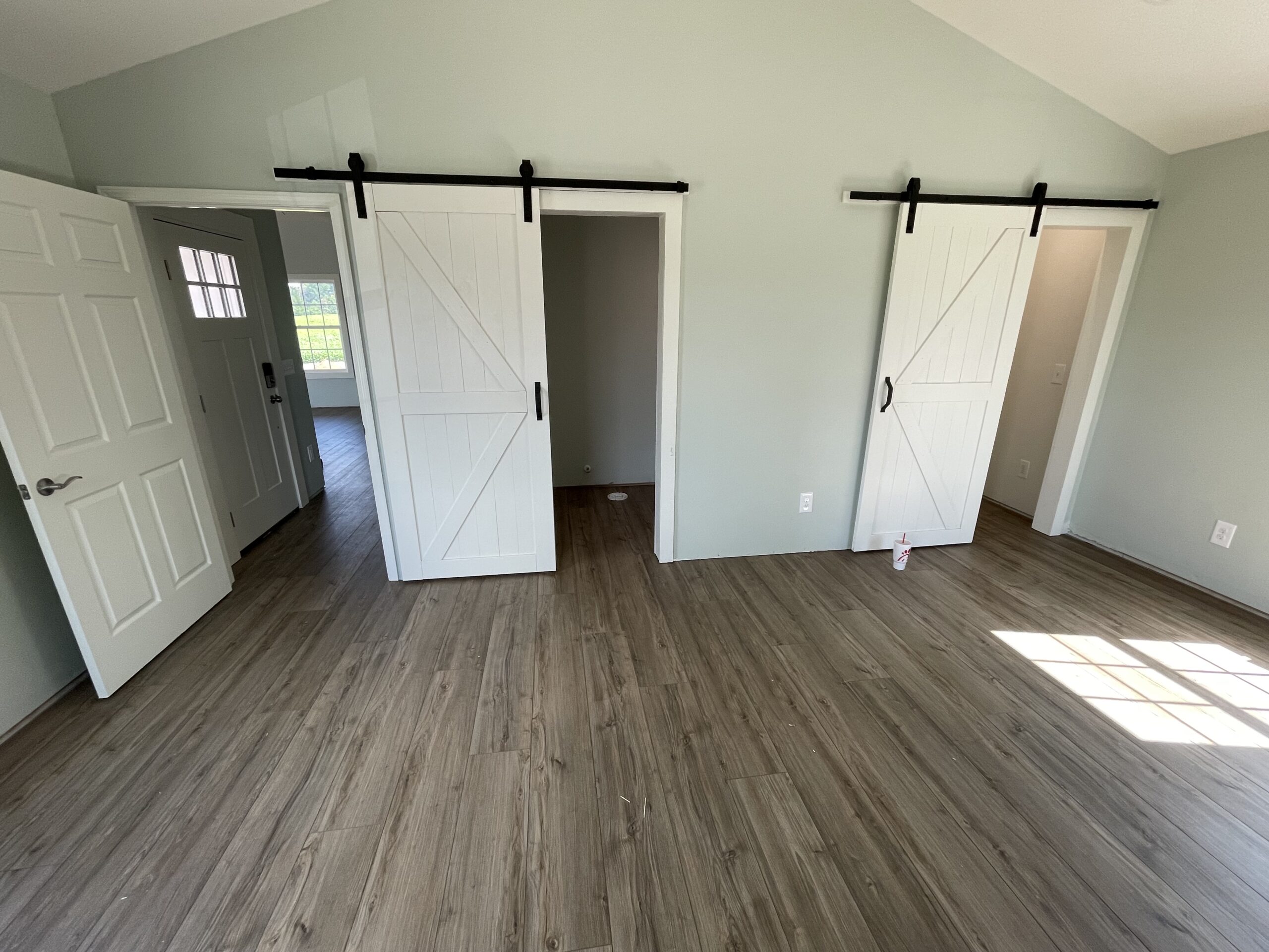 Continuous LVP flooring throughout. Cleanly cut, correctly spaced. Text photos + sqft for fast estimate.
