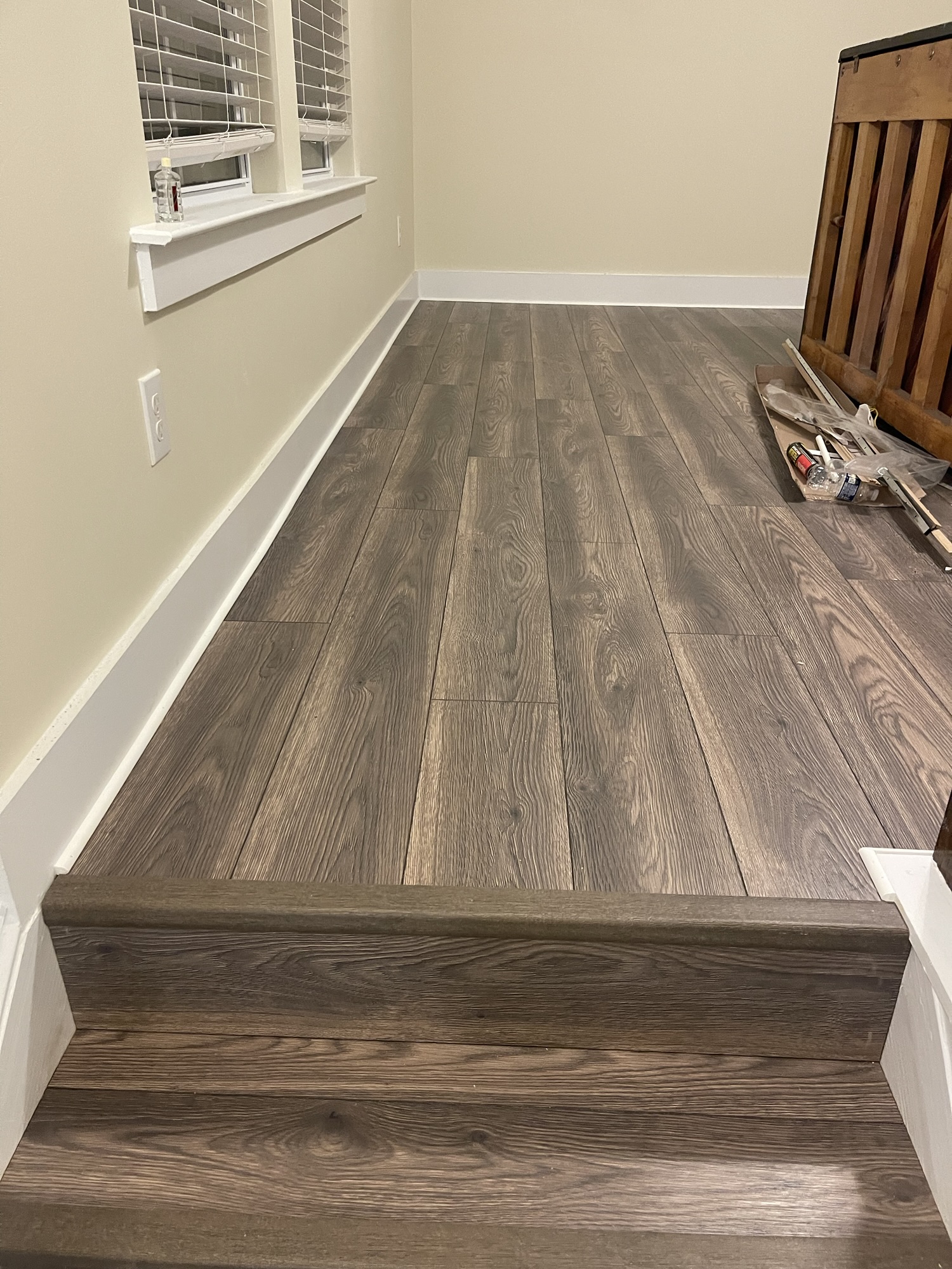 Clean stair nose installation with matching tread and riser finish