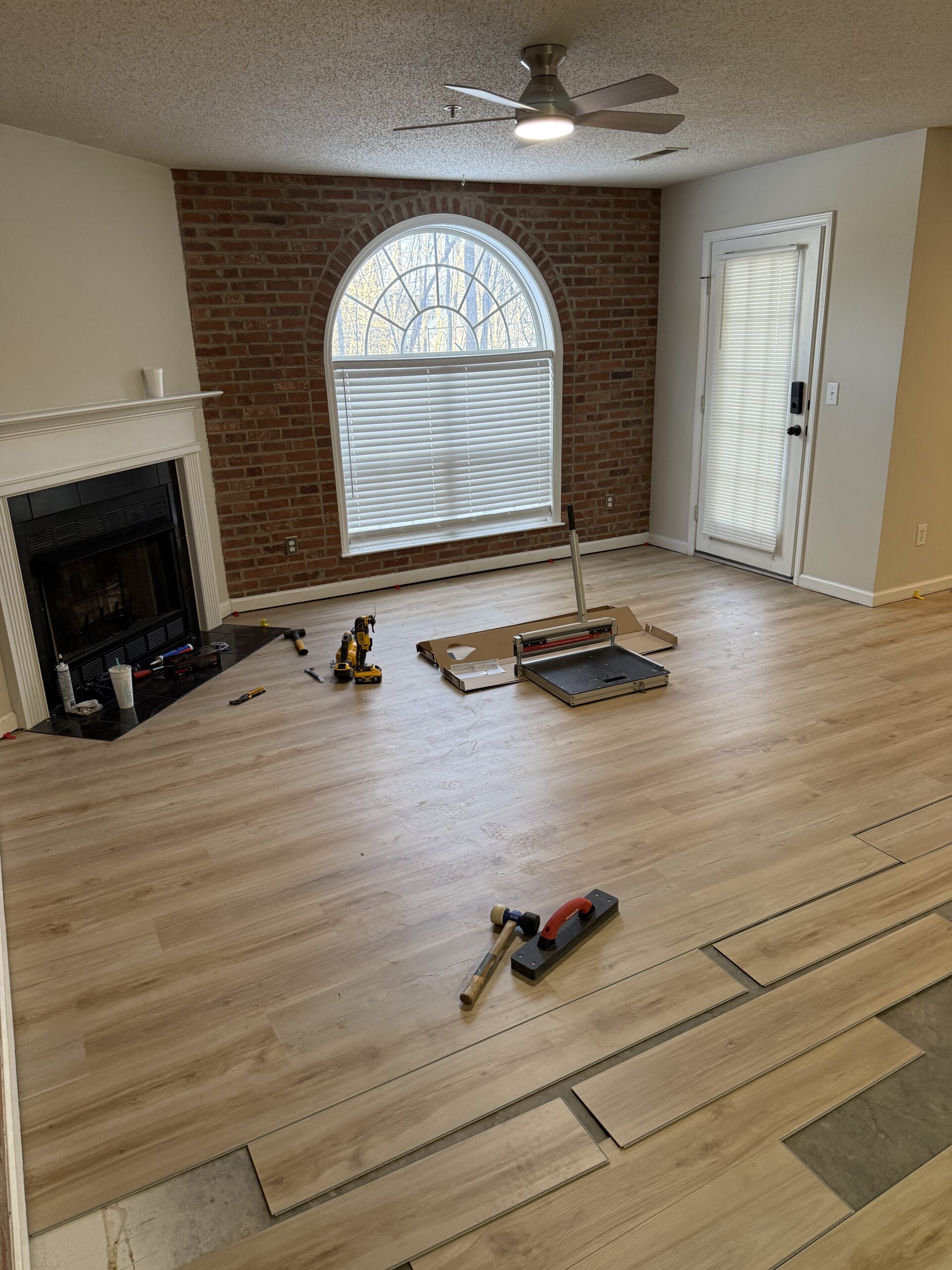 Installed continuous luxury vinyl plank throughout living areas in Winston-Salem, NC.